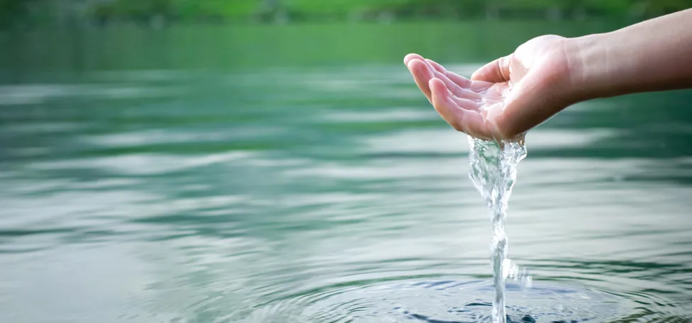 Hand with clean water - VCS Denmark